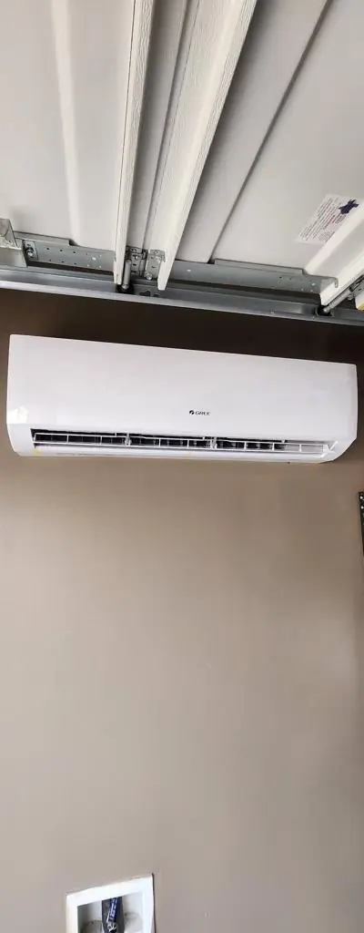 Gree ductless wall head mounted inside a garage